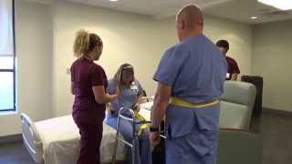 Physical Therapy Transfer Training  How To Transfer From Wheelchair To Bed [upl. by Ilehs]